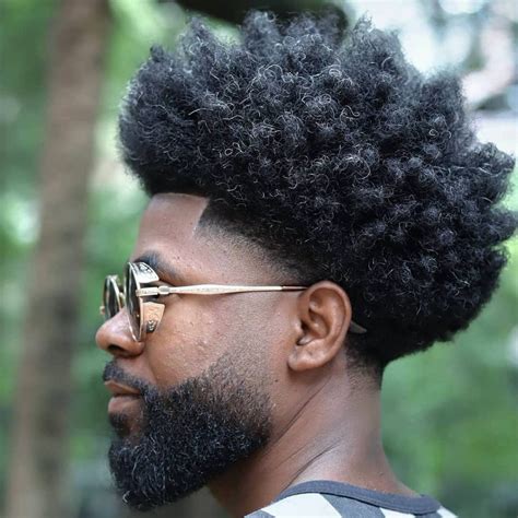 Drop taper fade. The drop taper haircut is a popular and modern variation of the renowned undercut taper haircut and taper fade. The drop taper is low behind the ear and down to the back of the neck. Drop taper hairstyle is easily achieved with men who have afros. 